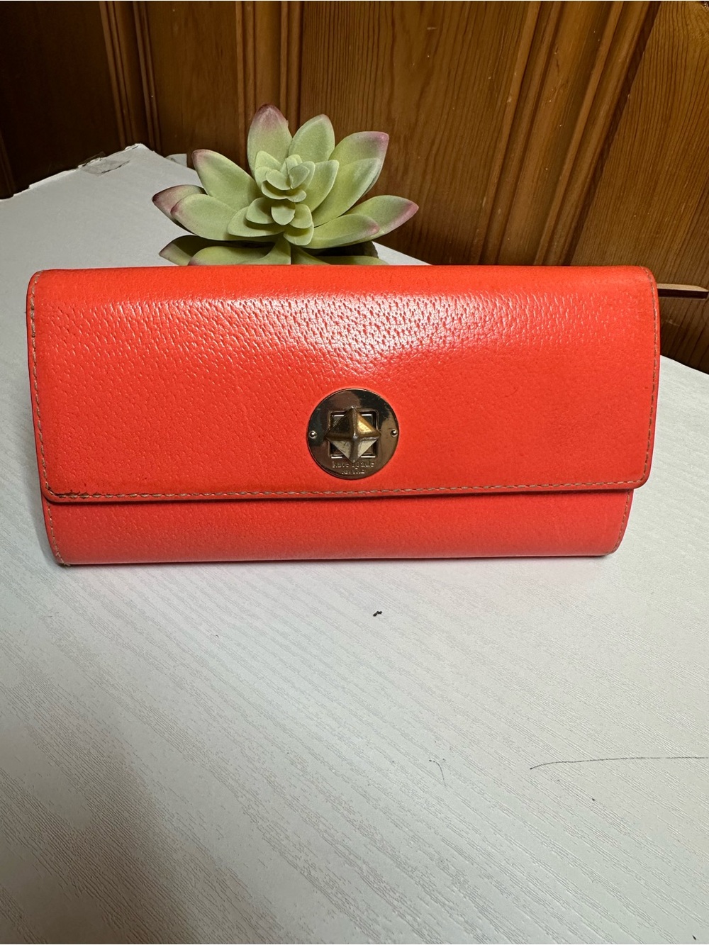 kate spade Coral Orange Leather Wallet with Gold-Tone Emblem